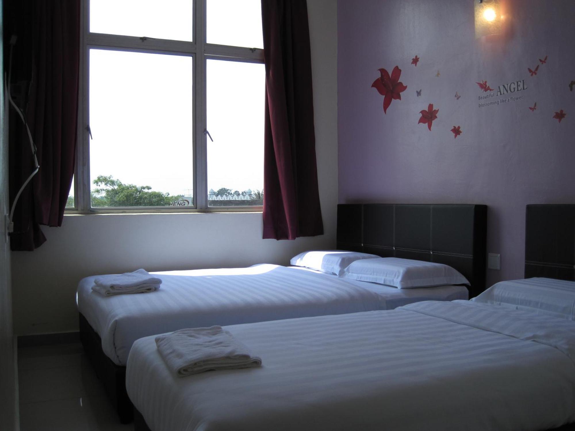 Max Inn Hotel Parit Raja Habitación foto